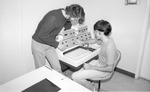 Paul Scudder with student by New College of Florida